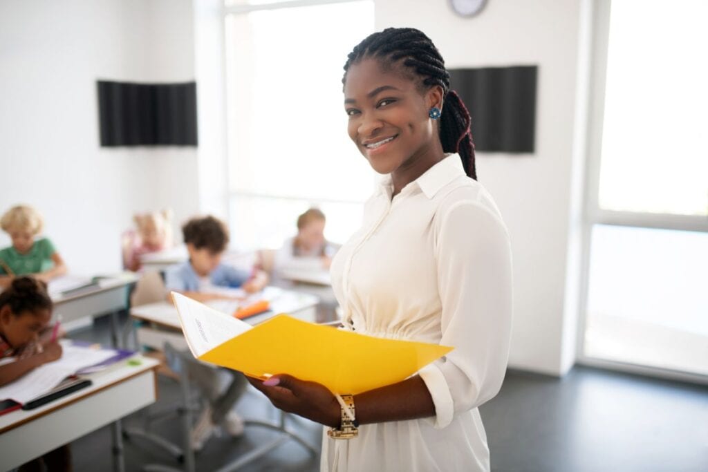 Teacher holding folder